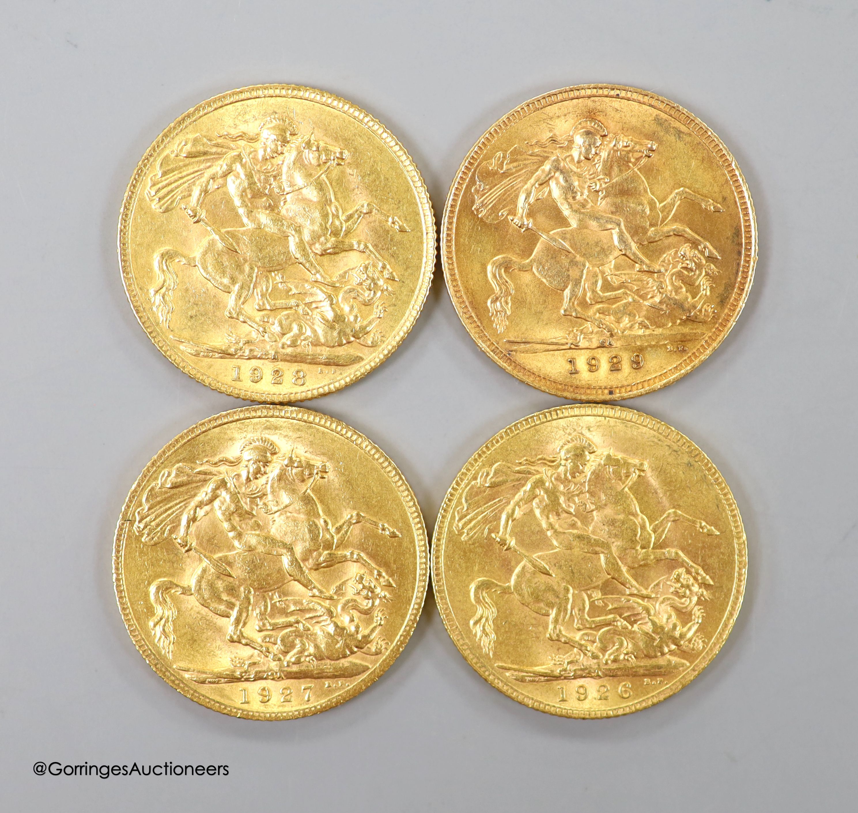 Four George V gold sovereigns, 1926, 1927, 1928 and 1929, all South Africa mint
